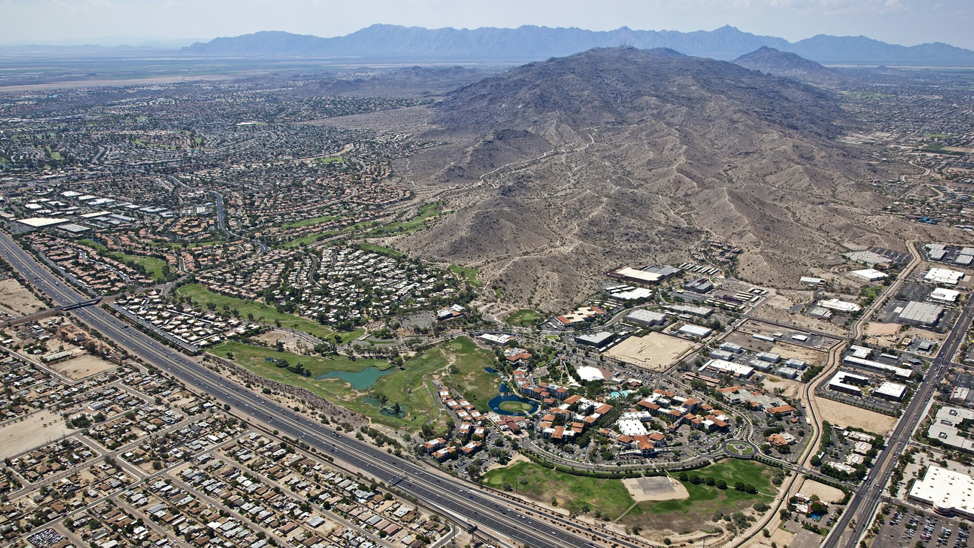 Aerial view of Guadalupe, Arizona at the foot of South Mountain beside I-10