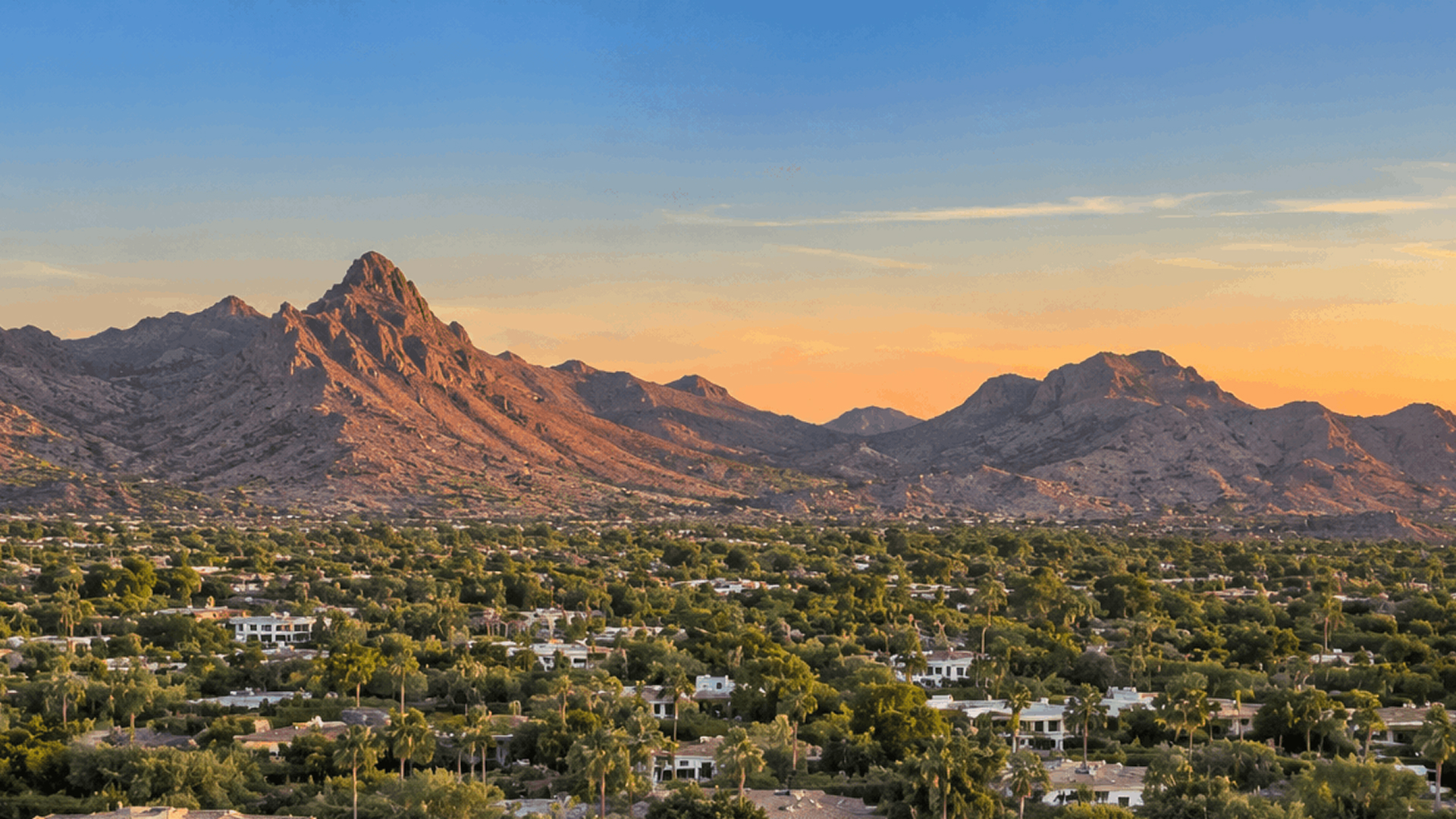 Camelback Mountain above Paradise Valley, Arizona homes at sunset